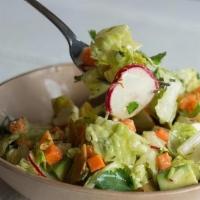 Chopped Salad · chopped romaine, pickled carrots, crushed tortilla chips, queso fresco, cilantro, avocado, a...