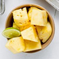 Fresh Pineapple · served with a wedge of lime