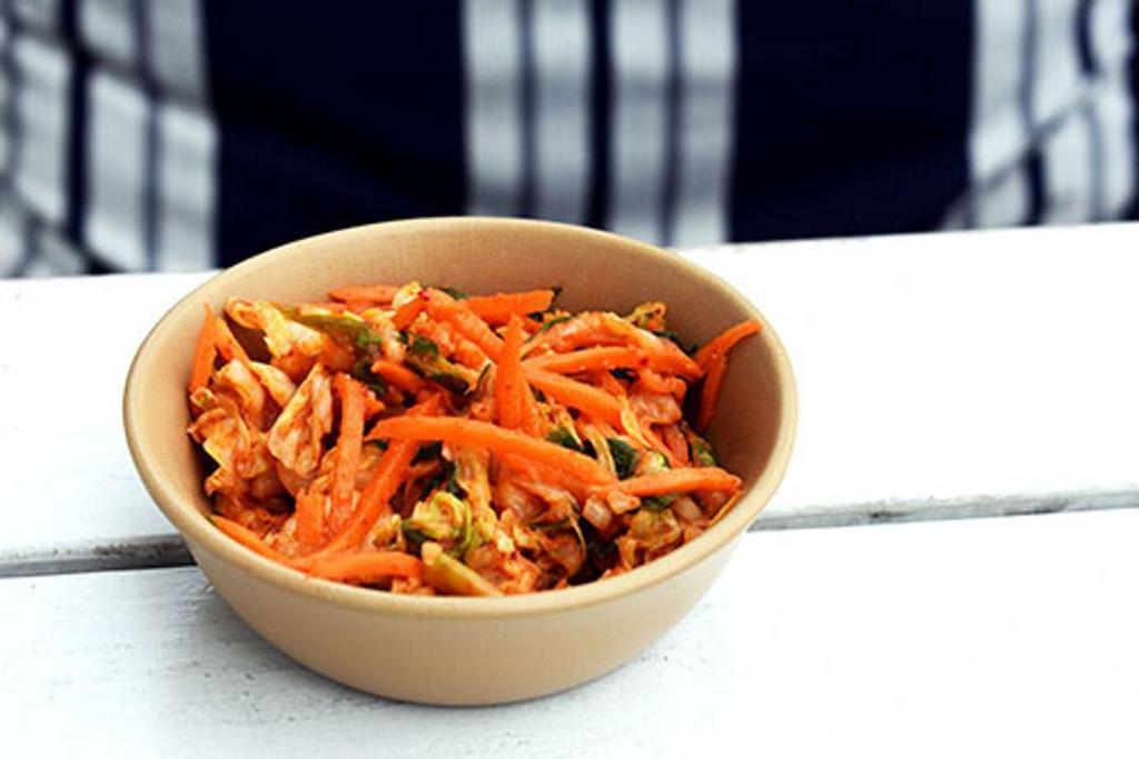 Kimchi · spicy Korean style condiment with Nappa Cabbage, carrot and green onion. contains: soy, fish, garlic, onion