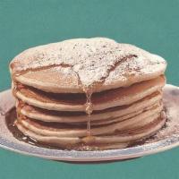 Cinnamon Sugar Pannies · 2 cinnamon sugar pancakes served with maple syrup, butter, and dusted with powdered sugar.