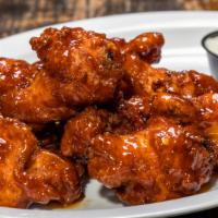 Wings · Ten pieces of chicken wings and thighs, choice of buffalo or bbq sauce.
