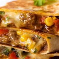 Quesadilla · Chicken or beef, tomatoes, onions. American cheese, choice of wheat or flour tortilla wrap.