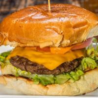 Classic Burger · Beef patty, lettuce, tomato, American cheese, choice of multigrain or butter bun.