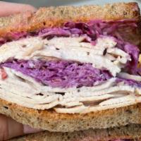 Jewish Boy From Queens · Sliced freshly roasted turkey, homemade coleslaw, Russian dressing on M.O.M. Rye bread with ...