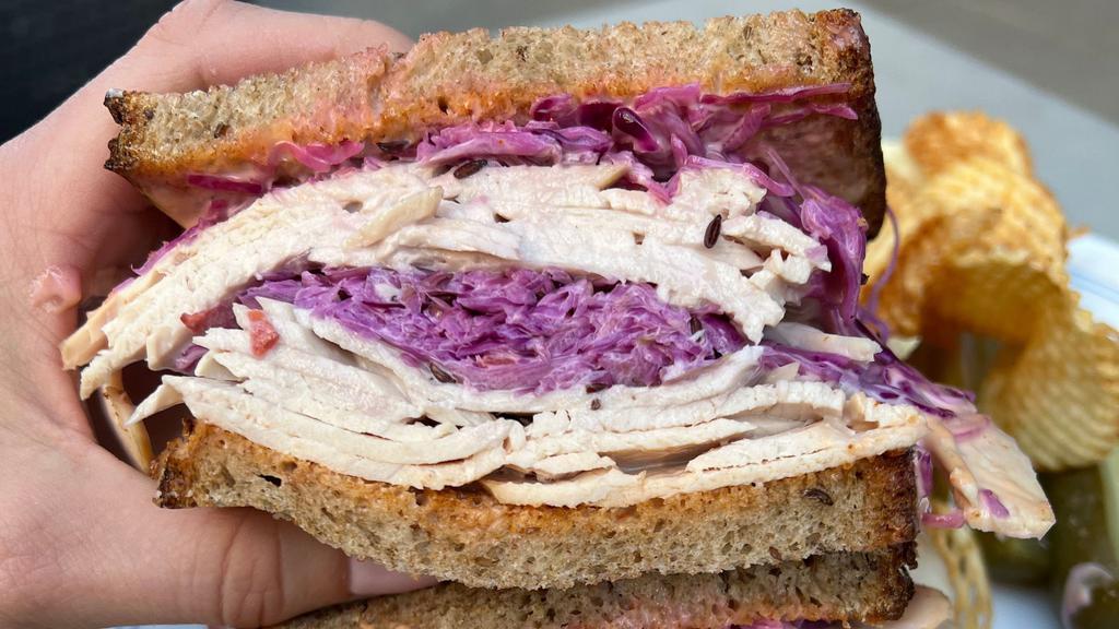 Jewish Boy From Queens · Sliced freshly roasted turkey, homemade coleslaw, Russian dressing on M.O.M. Rye bread with homemade potato chips.