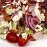Little Gem Blt Wedge Salad · Little gem lettuce, tomato, onion, blue cheese, crumbled bacon, Bistro dressing