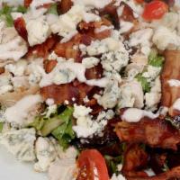 Club Salad  · Freshly-roasted turkey, applewood smoked bacon, tomato,
onion, blue cheese on mixed greens w...