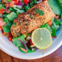 Roasted Salmon Salad · Gluten free. Herb marinated, roasted salmon over mixed spring green salad, Israeli salad and...
