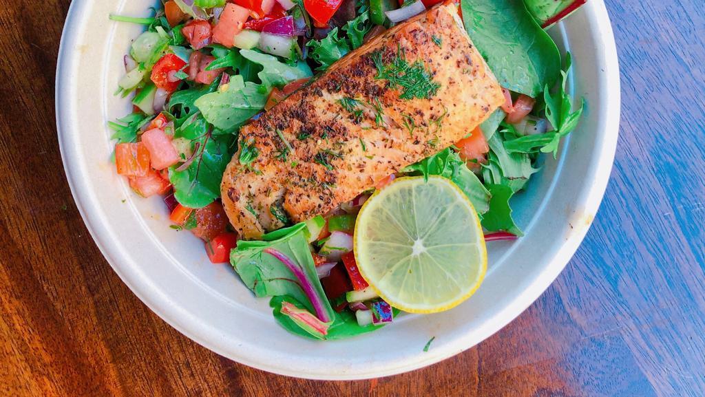 Roasted Salmon Salad · Gluten free. Herb marinated, roasted salmon over mixed spring green salad, Israeli salad and Foreverything pickles.
