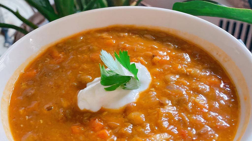 Curried Lentil Soup (12 Oz) · Vegan, gluten free. Thick, hearty veggie soup packed with flavor with a bit of a kick. Extra chili flakes upon request to take it up a notch.