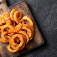 Curly Fries · Crispy, craveable curly fries salted to perfection.