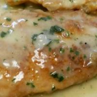 Chicken Francese · Wine, lemon, and butter sauce. Served with pasta and bread.