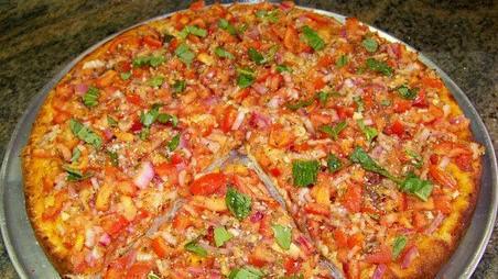 Bruschetta Pizza · Basil, onions, olive oil, garlic and tomato. No cheese.