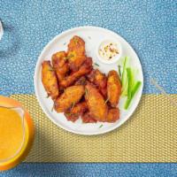 Chicken Wings · (12 pieces) Fresh chicken wings breaded and fried until golden brown.
