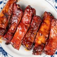 Barbecue Baby Back Ribs · Six pieces.