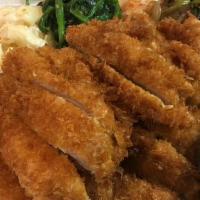 Chicken Katsu · Deep-fried panko-crusted chicken cutlet. Includes a bed of white rice and four sides.