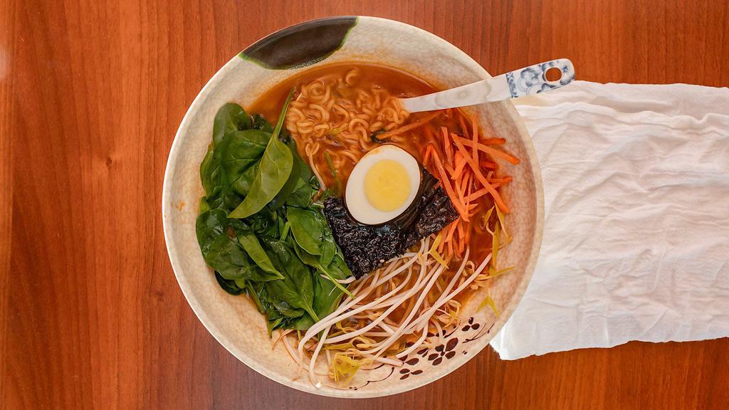 Ramyun · Topped with carrot, scallion, spinach, bean sprout, and half soft boiled egg.