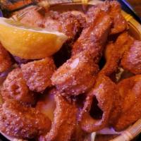 Crispy Fried Calamari · Crispy golden fried calamari w/ thai sweet chili sauce.