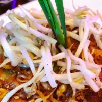 Pad Thai · Stir fried thin rice noodles with peanut, bean sprouts, shives, egg, sweet radish and bean c...