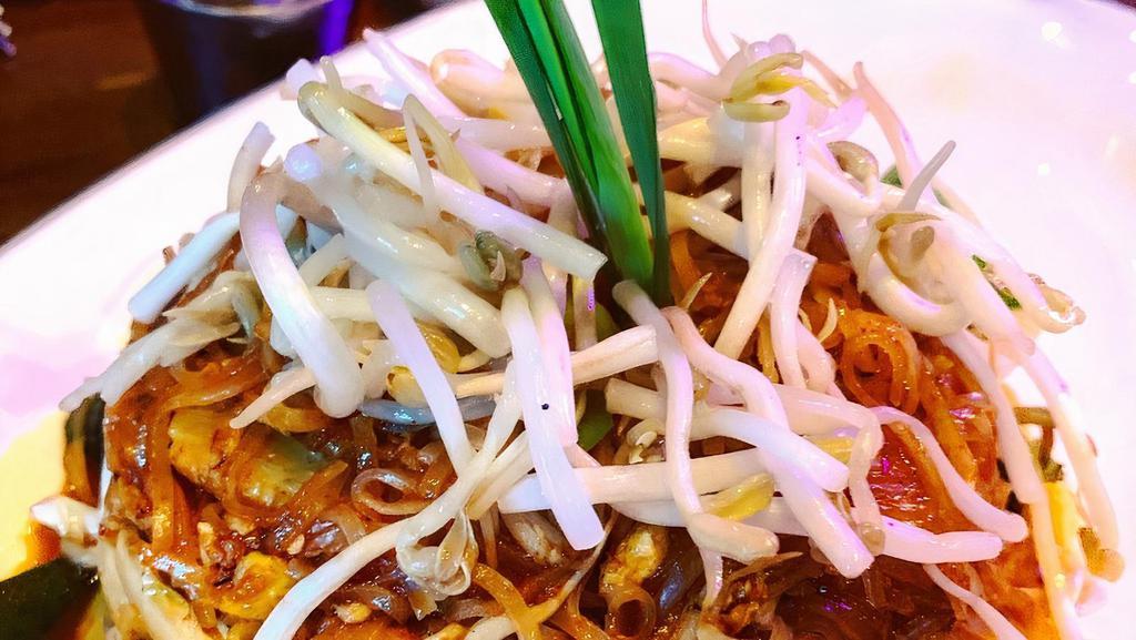 Pad Thai · Stir fried thin rice noodles with peanut, bean sprouts, shives, egg, sweet radish and bean curd.