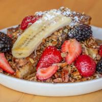 Nutella Stuffed French Toast · Nutella, nut crumble, blueberries, strawberries, banana, maple syrup.