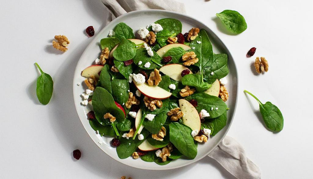 Apple Walnut Salad · Apples, walnuts, and cranberries with your choice of greens and dressing.