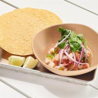 Ceviche · shrimp and cod tossed with fresh chiles, diced tomato and avocado in a bright citrus marinad...