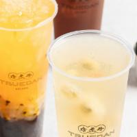 Passionfruit Green Tea With Nata De Coco And Black Pearls · Cold. Signature.