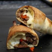 Sausage Pepperoni Roll · Tasty ingredients rolled up in our pizza crust. Pizza rolls served with one side of sauce.