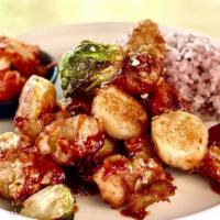 Korean Chicken And Gnocchi · Deep fried chicken with gochujang sauce, house made gnocchi nuts, purple rice, green salad &...
