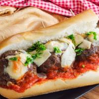 Meatball Parm Roll · Baked roll filled with meatballs and parmesan cheese. Customizable to customer's preference.