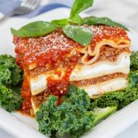 Meat Lasagna · Served with a side garden salad.