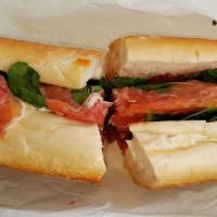 The Mike Anthony · Prosciutto, fresh Mozzarella, roasted peppers, arugula, and sun-dried tomatoes.