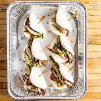 Shiitake Mushroom Buns · Vegan. Per piece. Steamed buns filled with sliced shiitake mushrooms, hoisin sauce, cucumber...