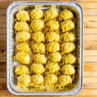 Chicken And Cabbage Dumplings · Per piece. Chicken and napa cabbage in wheat wrappers.