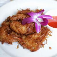 Coconut Shrimp · Crispy crusted coconut shrimp served with tamarind dipping sauce