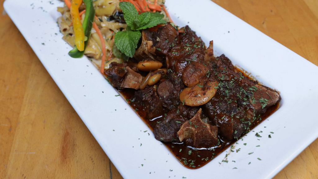 Oxtail · Slow-cooked, savory, fall off the bone oxtail with gravy