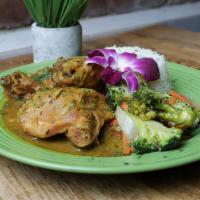 Curry Chicken · Chicken cooked in a curry sauce with aromatics, herbs and seasonings