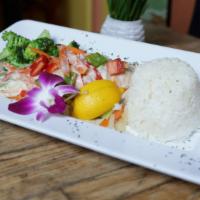 Coconut Salmon · Tender, juicy salmon cooked to perfection in our special coconut sauce