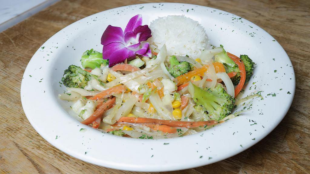 Veggie Cook-Up · A medley of vegetables mixed in a coconut creamy sauce. Served with jasmine rice.
