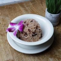 Coconut Rice & Peas · Rice infused with a coconut sauce