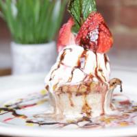 Bread Pudding · Soft, rich, and spice filled topped with delicious vanilla ice cream