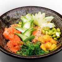 Zutto Poké · Salmon, spicy tuna, mango, cucumber, kani salad, seaweed salad, and edamame, tobiko, sesame ...
