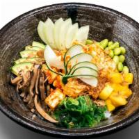 Veggie Poké · Shiitake mushroom, tofu, edamame, seaweed salad and cucumber, gochujang sauce, topped with f...