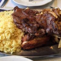 Bbq Combo Chicken & Pork Ribs · Comes with two sides.