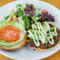 Garden Veggie Burger · Fresh sauteed squash, zucchini, eggplant, peas, carrots, and onions topped with avocado, let...