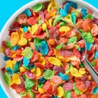 The Fruity Pebbles One · Fruity pebbles ice cream topped with more fruity pebbles and marshmallow drizzle.