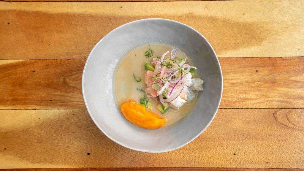 Ceviche Palteado · Fresh fish and shrimp with avocado, in an aji amarillo leche de tigre, Peruvian corn, yam.