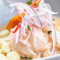 Ceviche Shot · A single serving of our ceviche mixto- fluke, shrimp, octopus and clams in a rocoto leche de...