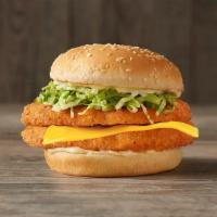 Spicy Chicken Deluxe · Crispy, spicy chicken with melty American cheese,  tomato, iceberg lettuce, and mayonnaise o...